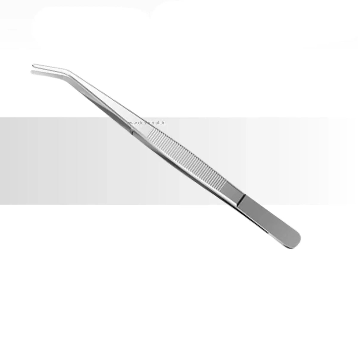 Metal tweezers on a white background