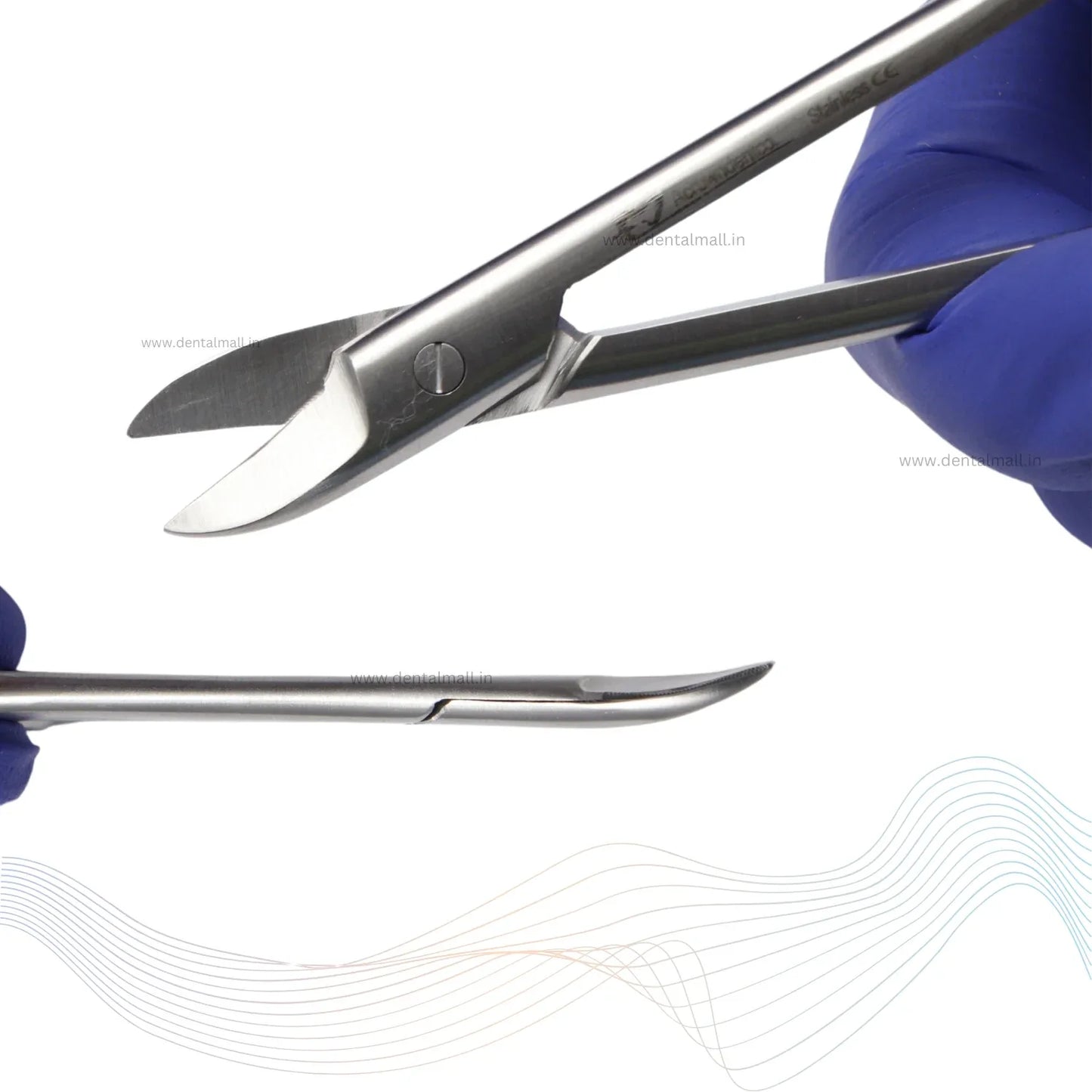 Stainless steel surgical scissors held by a gloved hand on a white background