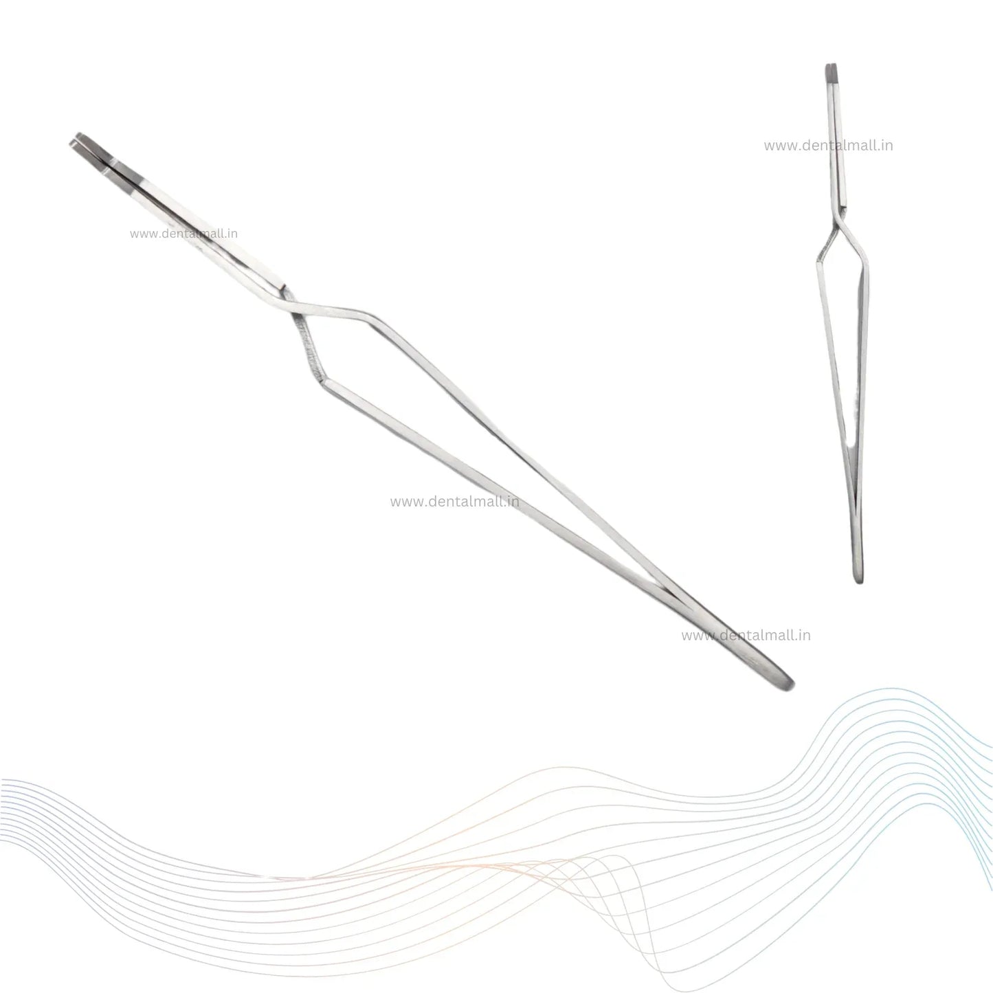 Metal dental instruments on a white background
