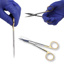 Hands in blue gloves holding surgical scissors on a white background