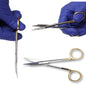 Hands in blue gloves holding surgical scissors and tweezers on a white background.